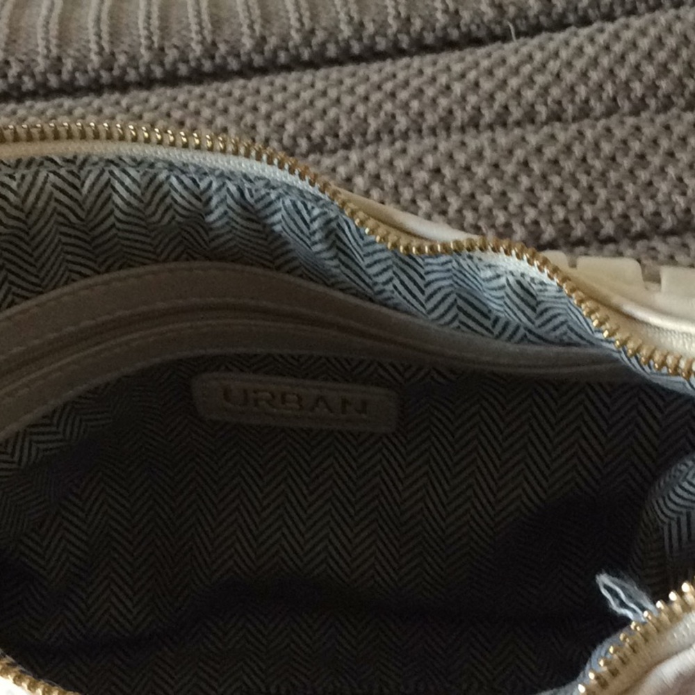 Buttery soft Urban Expression cream handbag. - Picture 2 of 4